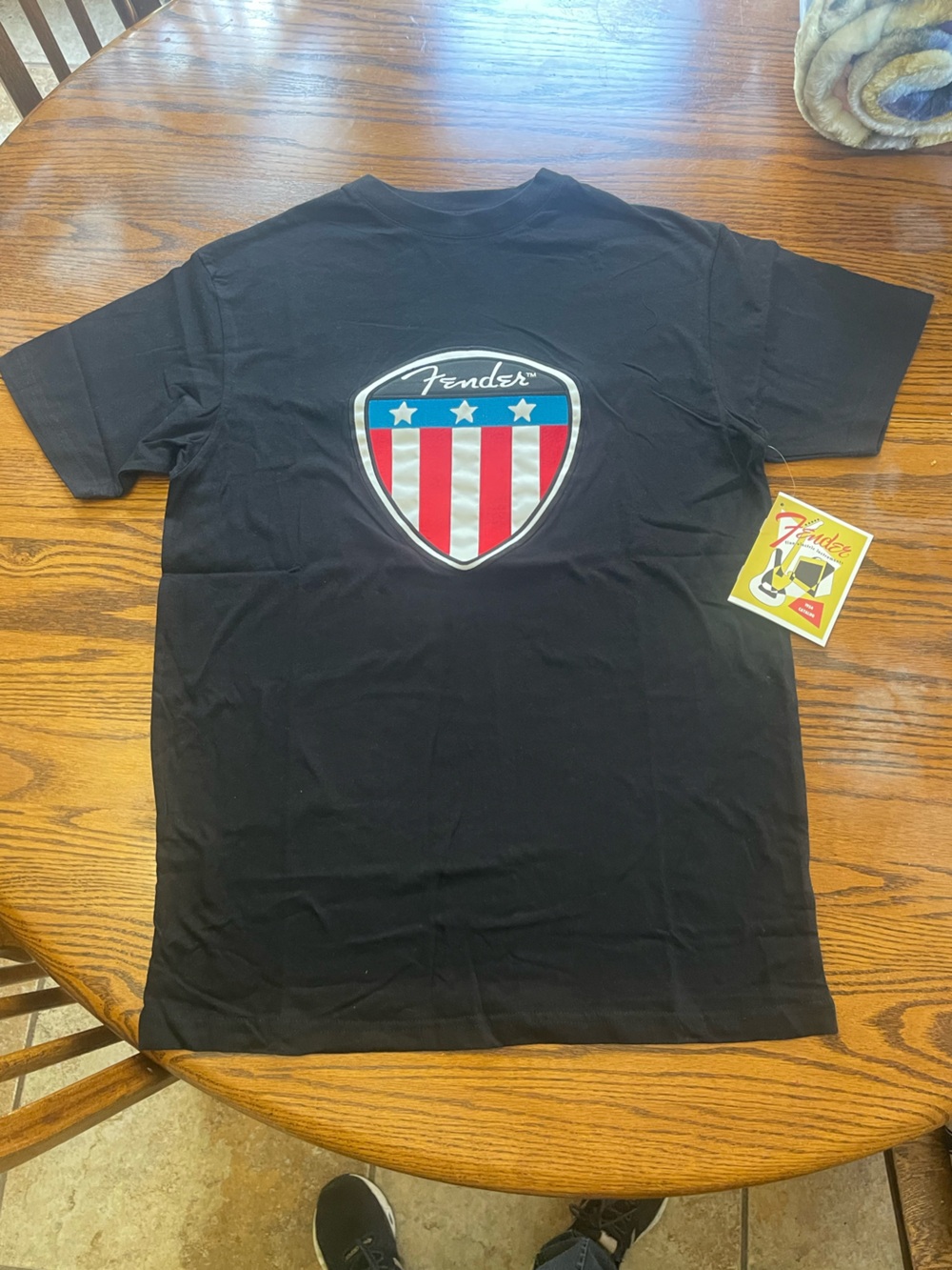 NWOT huge patch Fender Black men’sTee with Red, White & Blue Shield Logo
